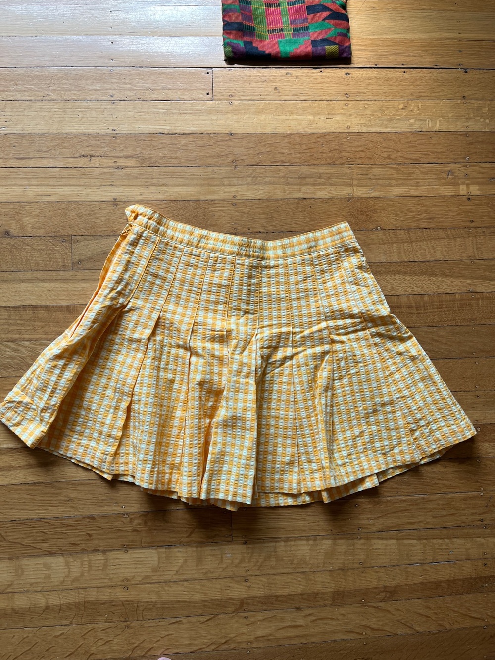 Urban Outfitters seersucker yellow tennis skirt mini pleated preppy schoolgirl M